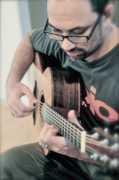 anton fingerpicking acoustic guitar
