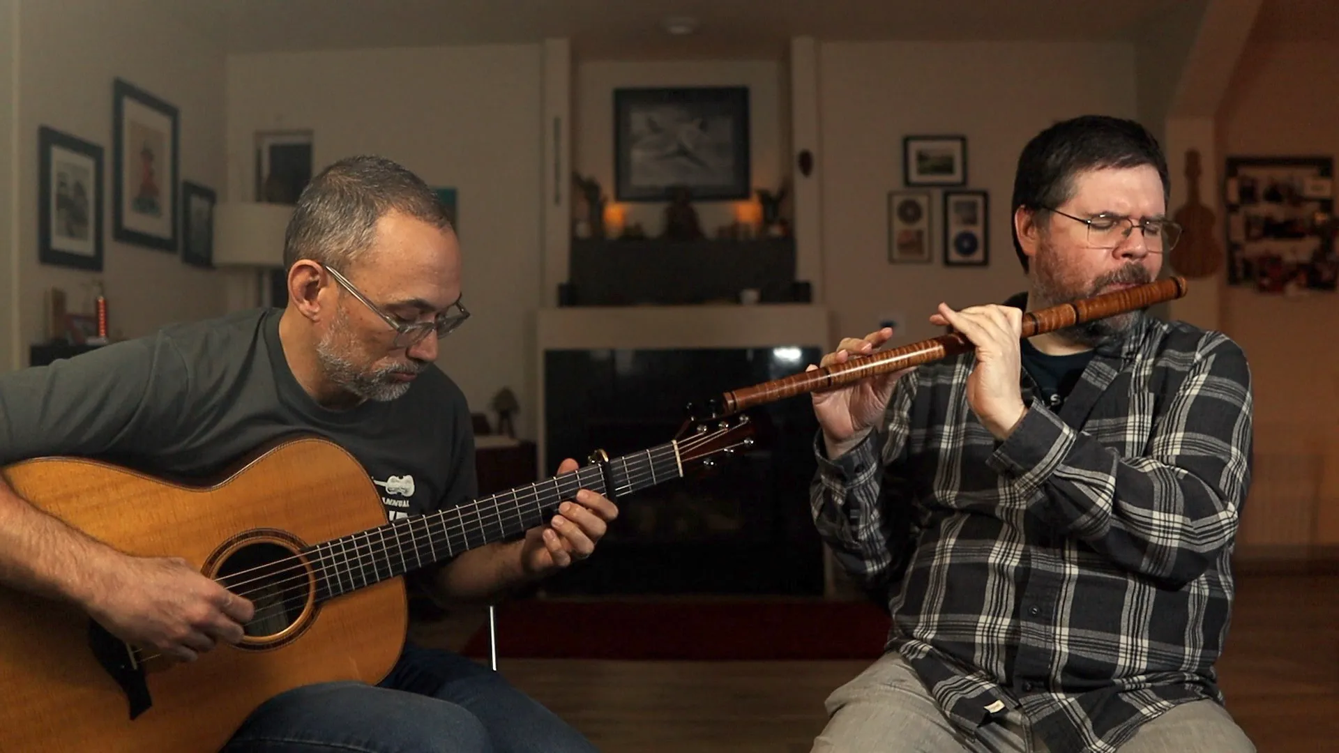 William and Anton playing irish flute and acoustic guitar in the living room